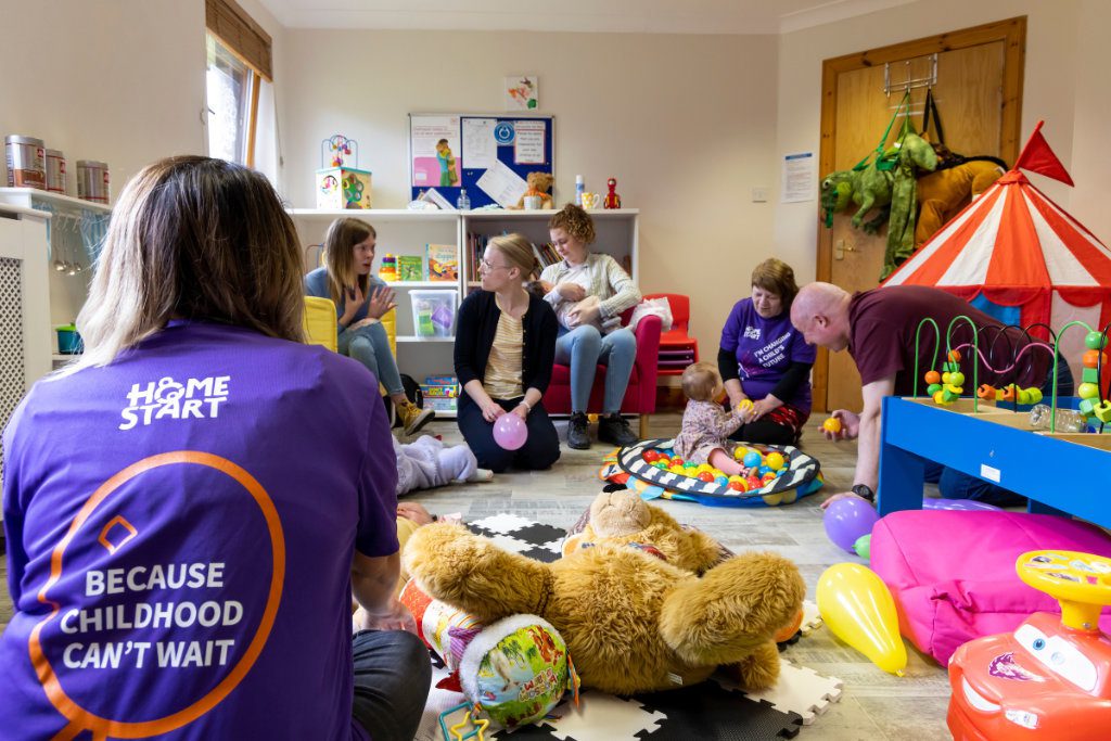 Funders volunteer family group session